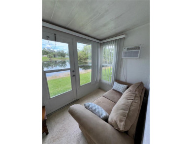 Make this BEAUTIFULLY FURNISHED well-kept 2-bedroom 2-bath in on Summertree Golf Course in Florida - for sale on GolfHomes.com, golf home, golf lot