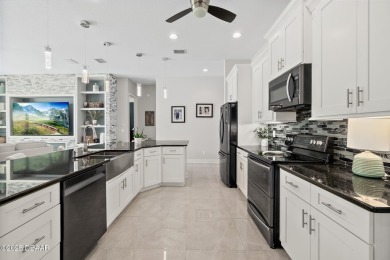 Experience a life of unparalleled luxury and serenity. This on Plantation Bay Golf and Country Club in Florida - for sale on GolfHomes.com, golf home, golf lot