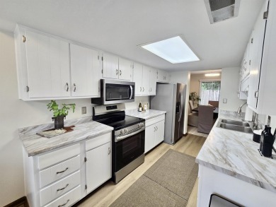 Looking for easy living in a central location with convenience on Hilaman Park Golf Course in Florida - for sale on GolfHomes.com, golf home, golf lot