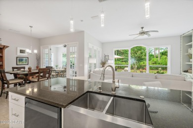 Experience a life of unparalleled luxury and serenity. This on Plantation Bay Golf and Country Club in Florida - for sale on GolfHomes.com, golf home, golf lot