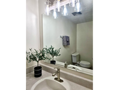Looking for easy living in a central location with convenience on Hilaman Park Golf Course in Florida - for sale on GolfHomes.com, golf home, golf lot