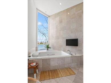 4010 Clubhouse Drive: Where Architectural Light Meets Lakeside on Lincolnshire Fields Country Club in Illinois - for sale on GolfHomes.com, golf home, golf lot