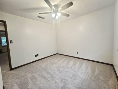 Looking for easy living in a central location with convenience on Hilaman Park Golf Course in Florida - for sale on GolfHomes.com, golf home, golf lot