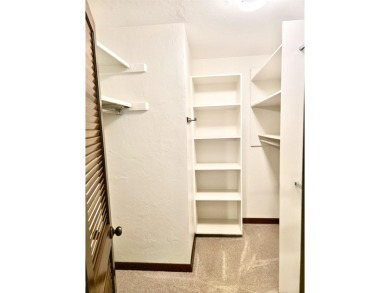 Looking for easy living in a central location with convenience on Hilaman Park Golf Course in Florida - for sale on GolfHomes.com, golf home, golf lot