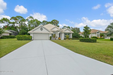Experience a life of unparalleled luxury and serenity. This on Plantation Bay Golf and Country Club in Florida - for sale on GolfHomes.com, golf home, golf lot