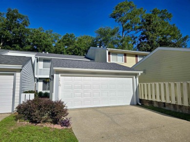 Looking for easy living in a central location with convenience on Hilaman Park Golf Course in Florida - for sale on GolfHomes.com, golf home, golf lot