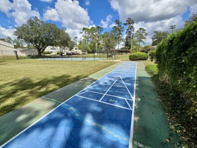 Looking for easy living in a central location with convenience on Hilaman Park Golf Course in Florida - for sale on GolfHomes.com, golf home, golf lot