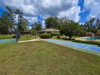 Looking for easy living in a central location with convenience on Hilaman Park Golf Course in Florida - for sale on GolfHomes.com, golf home, golf lot
