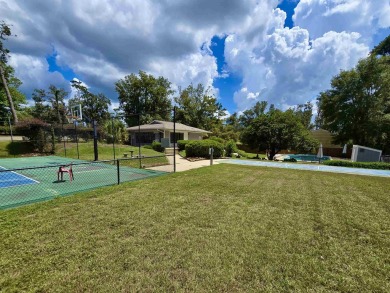 Looking for easy living in a central location with convenience on Hilaman Park Golf Course in Florida - for sale on GolfHomes.com, golf home, golf lot