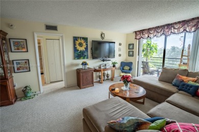 Welcome to this immaculate 2-bedroom, 2-bathroom condo on the on Pembroke Lakes Golf Club in Florida - for sale on GolfHomes.com, golf home, golf lot