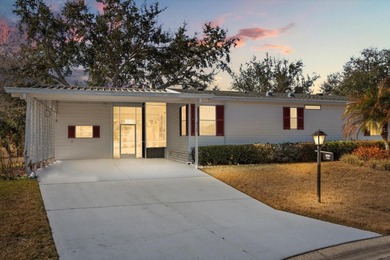 WHITE WALLS IN KITCHEN AND BEDROOM COMING SOON. PICTURES ARE on Zellwood Station Country Club in Florida - for sale on GolfHomes.com, golf home, golf lot