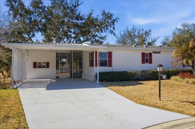 WHITE WALLS IN KITCHEN AND BEDROOM COMING SOON. PICTURES ARE on Zellwood Station Country Club in Florida - for sale on GolfHomes.com, golf home, golf lot