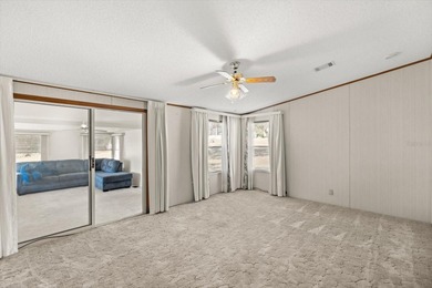 WHITE WALLS IN KITCHEN AND BEDROOM COMING SOON. PICTURES ARE on Zellwood Station Country Club in Florida - for sale on GolfHomes.com, golf home, golf lot