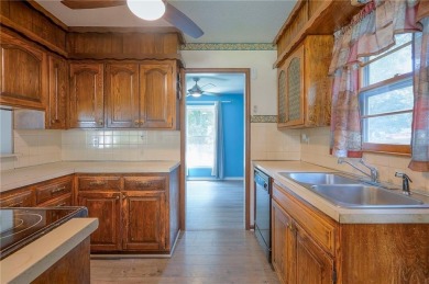 Large raised ranch in desirable Fairway Hills...Newer interior on Royal Meadows Golf Course in Missouri - for sale on GolfHomes.com, golf home, golf lot