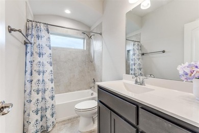 Welcome to this well-maintained 4-bedroom, 3.5-bath two-story on The Golf Club At Champions Circle in Texas - for sale on GolfHomes.com, golf home, golf lot