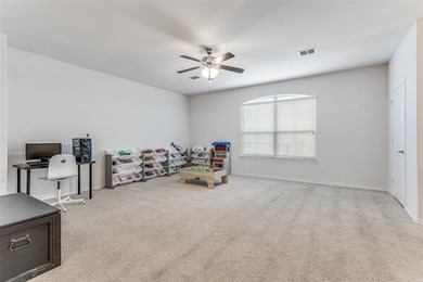 Welcome to this well-maintained 4-bedroom, 3.5-bath two-story on The Golf Club At Champions Circle in Texas - for sale on GolfHomes.com, golf home, golf lot