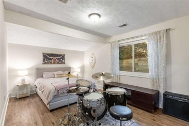 Welcome to this beautiful mid-century ranch-style house located on Rivermont Golf and Country Club in Georgia - for sale on GolfHomes.com, golf home, golf lot