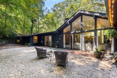 Welcome to this beautiful mid-century ranch-style house located on Rivermont Golf and Country Club in Georgia - for sale on GolfHomes.com, golf home, golf lot