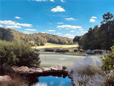 Welcome to this beautiful mid-century ranch-style house located on Rivermont Golf and Country Club in Georgia - for sale on GolfHomes.com, golf home, golf lot