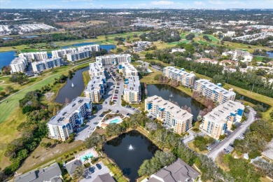 Come see this Stunning Corner Condo in Largo's Gulf Lake Condo on East Bay Golf Club in Florida - for sale on GolfHomes.com, golf home, golf lot