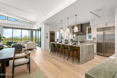 This exquisite upper-level corner residence is south facing and on Desert Mountain Golf Club - Renegade Course in Arizona - for sale on GolfHomes.com, golf home, golf lot