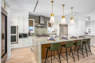 This exquisite upper-level corner residence is south facing and on Desert Mountain Golf Club - Renegade Course in Arizona - for sale on GolfHomes.com, golf home, golf lot