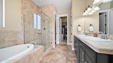 Welcome home to the heart of Redlands Mesa, where breathtaking on The Golf Club At Redlands Mesa in Colorado - for sale on GolfHomes.com, golf home, golf lot