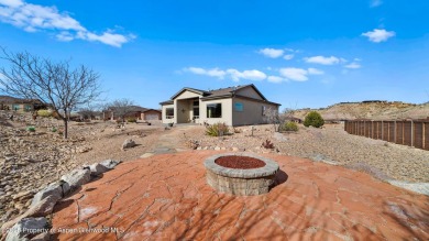 Welcome home to the heart of Redlands Mesa, where breathtaking on The Golf Club At Redlands Mesa in Colorado - for sale on GolfHomes.com, golf home, golf lot