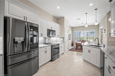 Welcome to this exceptional lakefront and golf-course home in on Palmira Golf and Country Club in Florida - for sale on GolfHomes.com, golf home, golf lot