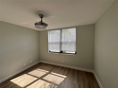 Luxury fully renovated 2BR/2BA golf course and lake view condo on Feather Sound Country Club in Florida - for sale on GolfHomes.com, golf home, golf lot