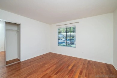 Charming ground-floor condo in Rancho Bernardo, freshly painted on Oaks North Golf Course in California - for sale on GolfHomes.com, golf home, golf lot