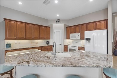 Welcome to this beautifully maintained Augusta model home on Lely Resort Golf and Country Club in Florida - for sale on GolfHomes.com, golf home, golf lot