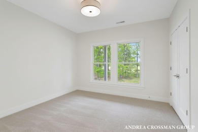 Welcome to your dream home nestled within the serene landscape on Muskegon Country Club in Michigan - for sale on GolfHomes.com, golf home, golf lot