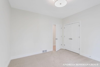 Welcome to your dream home nestled within the serene landscape on Muskegon Country Club in Michigan - for sale on GolfHomes.com, golf home, golf lot