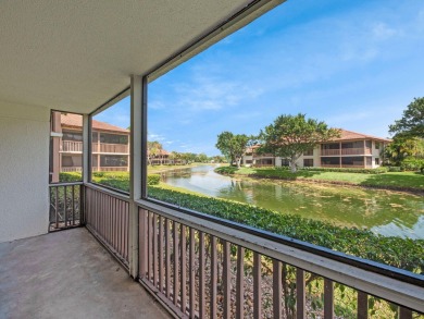 Very Rare Waterfront 1st Floor Condo: Enjoy the peaceful on PGA National Golf Club in Florida - for sale on GolfHomes.com, golf home, golf lot