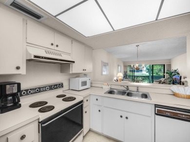 Very Rare Waterfront 1st Floor Condo: Enjoy the peaceful on PGA National Golf Club in Florida - for sale on GolfHomes.com, golf home, golf lot