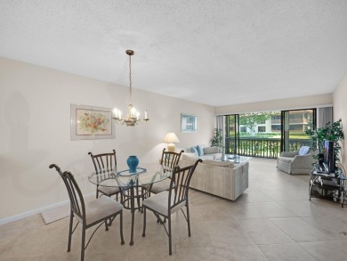 Very Rare Waterfront 1st Floor Condo: Enjoy the peaceful on PGA National Golf Club in Florida - for sale on GolfHomes.com, golf home, golf lot