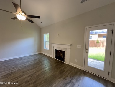 This stunning new 4-bedroom, 2.5-bath home in the gated Woodlake on Woodlake Country Club in North Carolina - for sale on GolfHomes.com, golf home, golf lot