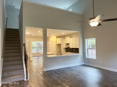 This stunning new 4-bedroom, 2.5-bath home in the gated Woodlake on Woodlake Country Club in North Carolina - for sale on GolfHomes.com, golf home, golf lot