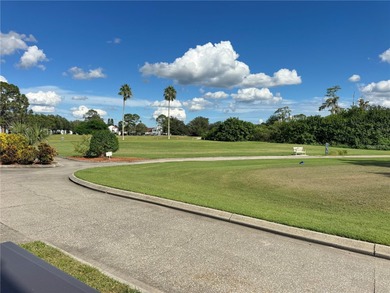 Tucked away from the rush of city living, this 1.03-acre lot in on Wedgefield Golf Club in Florida - for sale on GolfHomes.com, golf home, golf lot