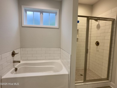 This stunning new 4-bedroom, 2.5-bath home in the gated Woodlake on Woodlake Country Club in North Carolina - for sale on GolfHomes.com, golf home, golf lot