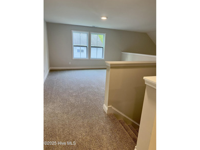 This stunning new 4-bedroom, 2.5-bath home in the gated Woodlake on Woodlake Country Club in North Carolina - for sale on GolfHomes.com, golf home, golf lot