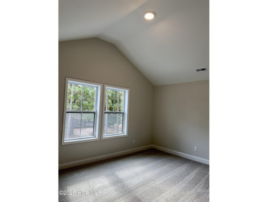 This stunning new 4-bedroom, 2.5-bath home in the gated Woodlake on Woodlake Country Club in North Carolina - for sale on GolfHomes.com, golf home, golf lot