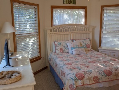 Escape and immerse yourself in the serenity of 'Sea The Green' on The Currituck Golf Club in North Carolina - for sale on GolfHomes.com, golf home, golf lot