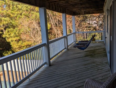 Escape and immerse yourself in the serenity of 'Sea The Green' on The Currituck Golf Club in North Carolina - for sale on GolfHomes.com, golf home, golf lot