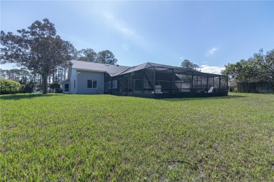 Beautiful, move in a ready canal home in the highly desirable on The Grand Club - Pine Lakes Course in Florida - for sale on GolfHomes.com, golf home, golf lot