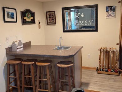 Escape and immerse yourself in the serenity of 'Sea The Green' on The Currituck Golf Club in North Carolina - for sale on GolfHomes.com, golf home, golf lot