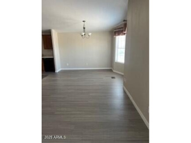 You owe it to yourself to come take a look at this newer 1400 on Apache Wells Country Club in Arizona - for sale on GolfHomes.com, golf home, golf lot