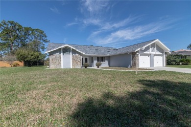 Beautiful, move in a ready canal home in the highly desirable on The Grand Club - Pine Lakes Course in Florida - for sale on GolfHomes.com, golf home, golf lot