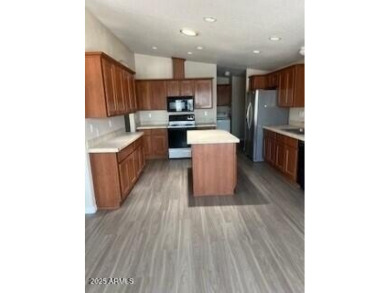 You owe it to yourself to come take a look at this newer 1400 on Apache Wells Country Club in Arizona - for sale on GolfHomes.com, golf home, golf lot